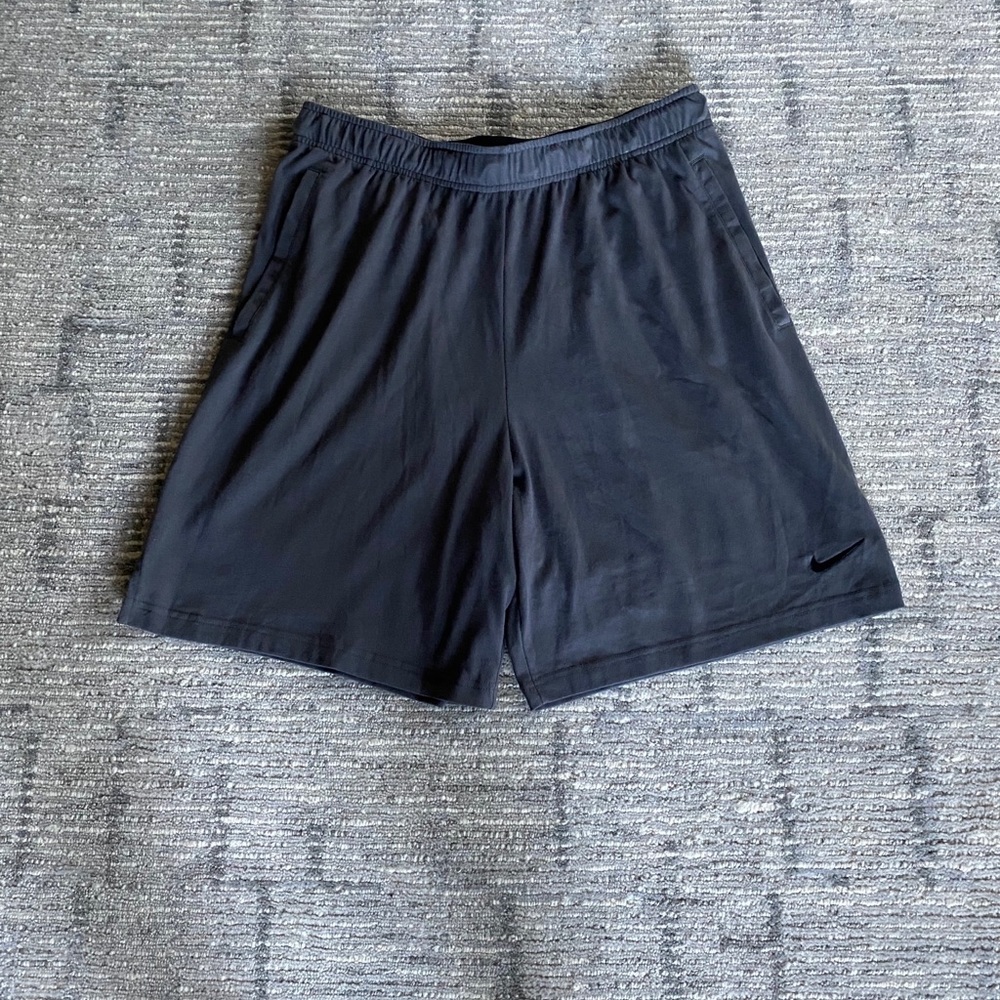 Men’s Gray Nike Workout Shorts.